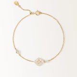 Bracelet Miroir en or jaune, losange de pierres rondes et baguettes sur chaîne ajustable, vue de face