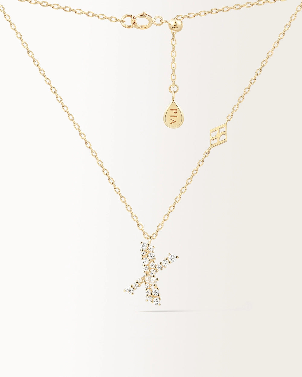 Collier Initiale X en or jaune