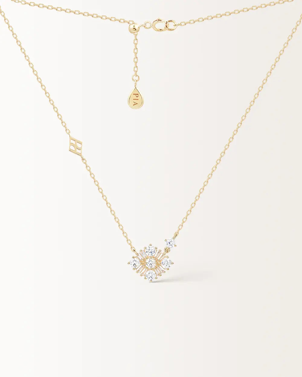 Collier Miroir en or jaune, losange de pierres rondes et baguettes sur chaîne ajustable, vue de face
