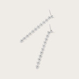 Boucles d'oreilles Alaïa en or blanc