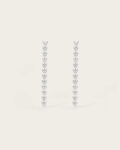 Boucles d'oreilles Alaïa en or blanc