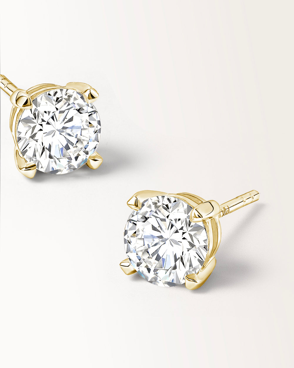 Boucles d'oreilles Infini 0.60 carat en or jaune et diamant de synthèse