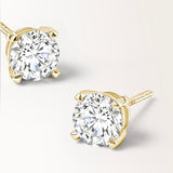 Boucles d'oreilles Infini 0.60 carat en or jaune et diamant de synthèse