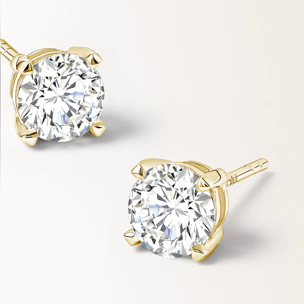 Boucles d'oreilles Infini 0.60 carat en or jaune et diamant de synthèse