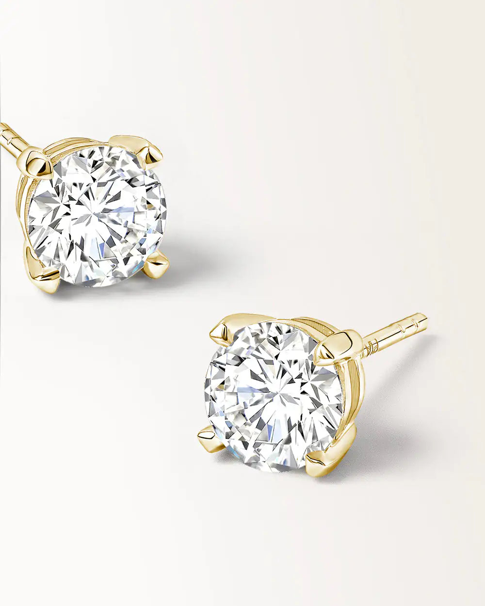 Boucles d'oreilles Infini 0.60 carat en or jaune et diamant de synthèse