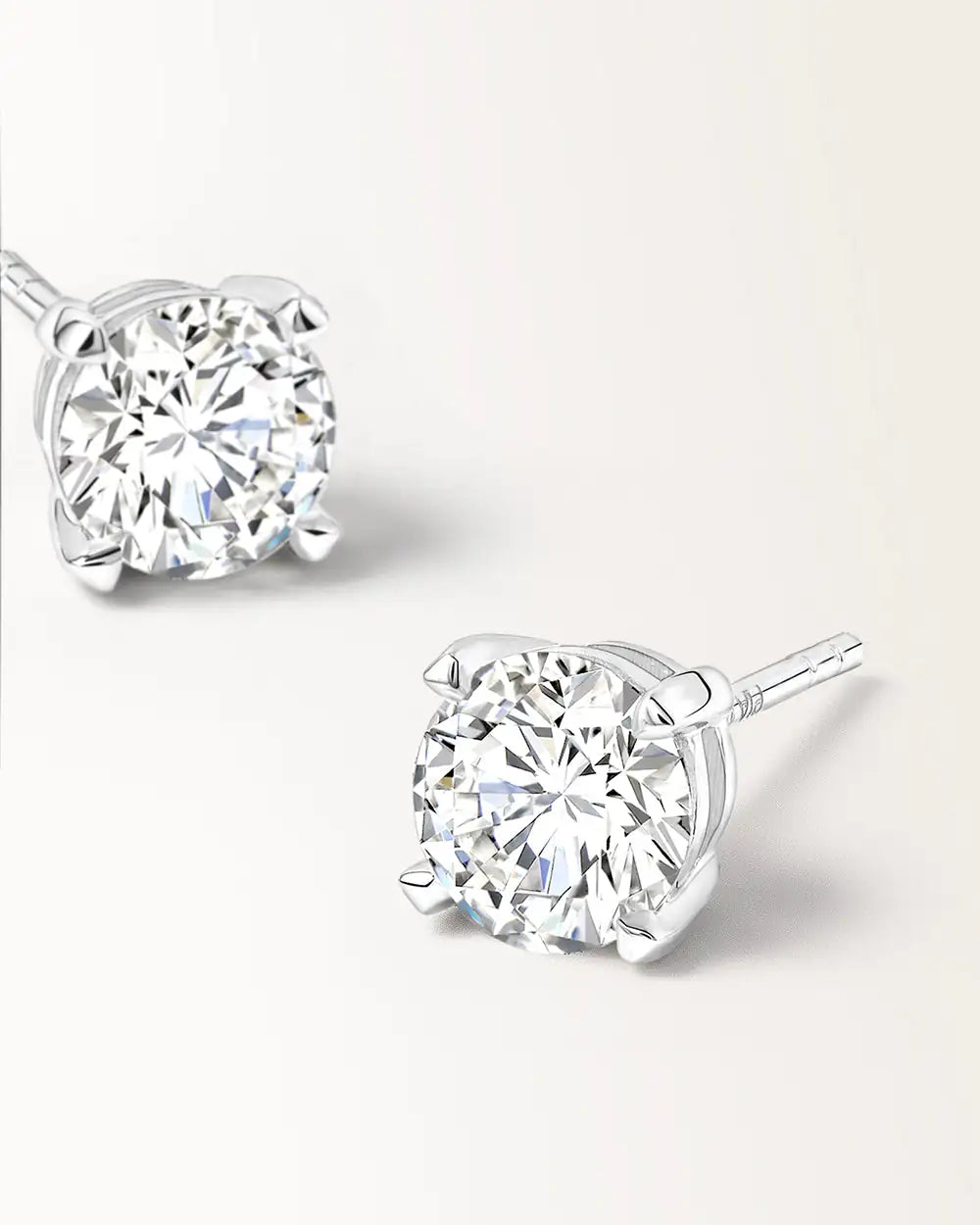 Boucles d'oreilles Infini 0.60 carat en or blanc