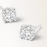 Boucles d'oreilles Infini 0.60 carat en or blanc