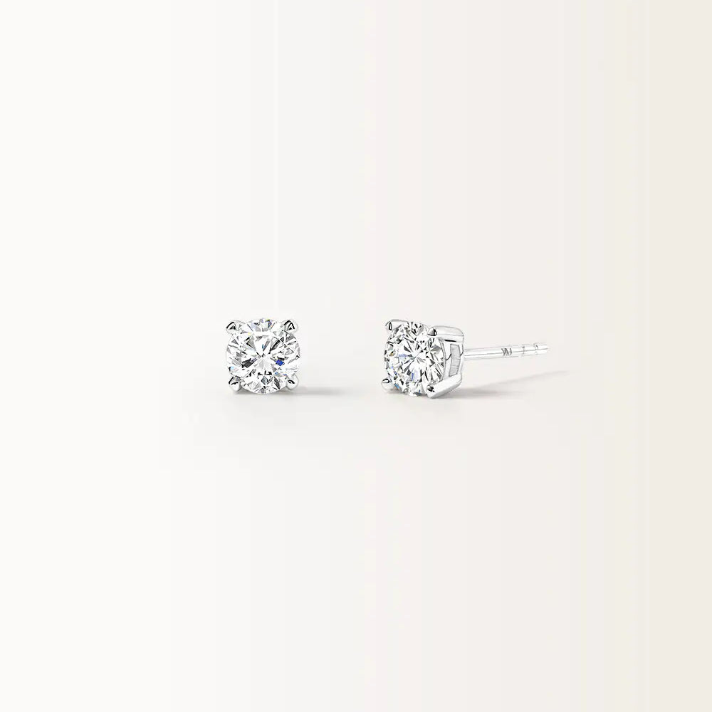 Boucles d'oreilles Infini 0.60 carat en or blanc