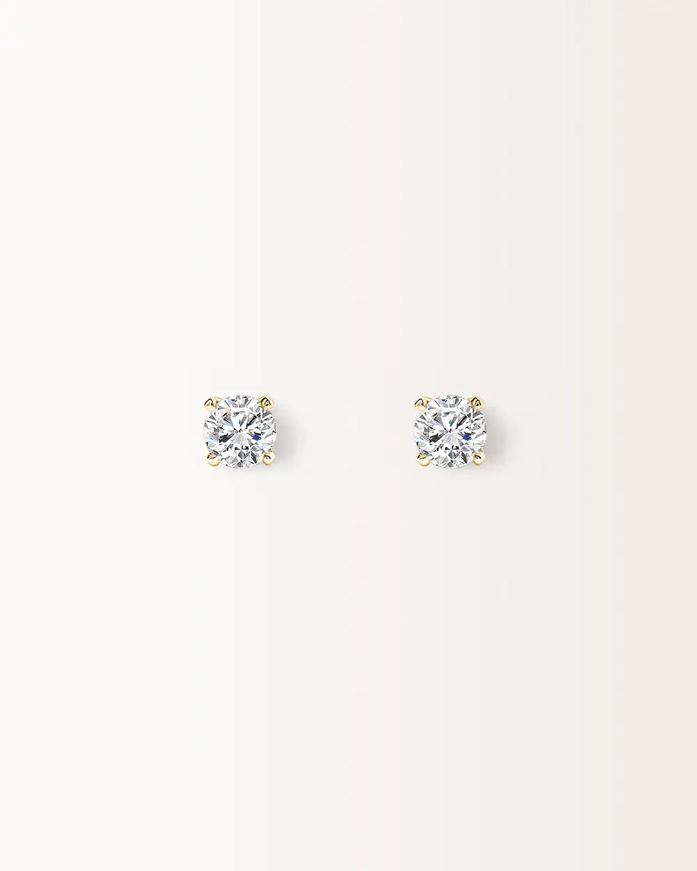 Boucles d'oreilles Infini 0.60 carat en or jaune et diamant de synthèse