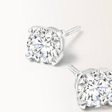 Boucles d'oreilles Infini 1 carat en or blanc