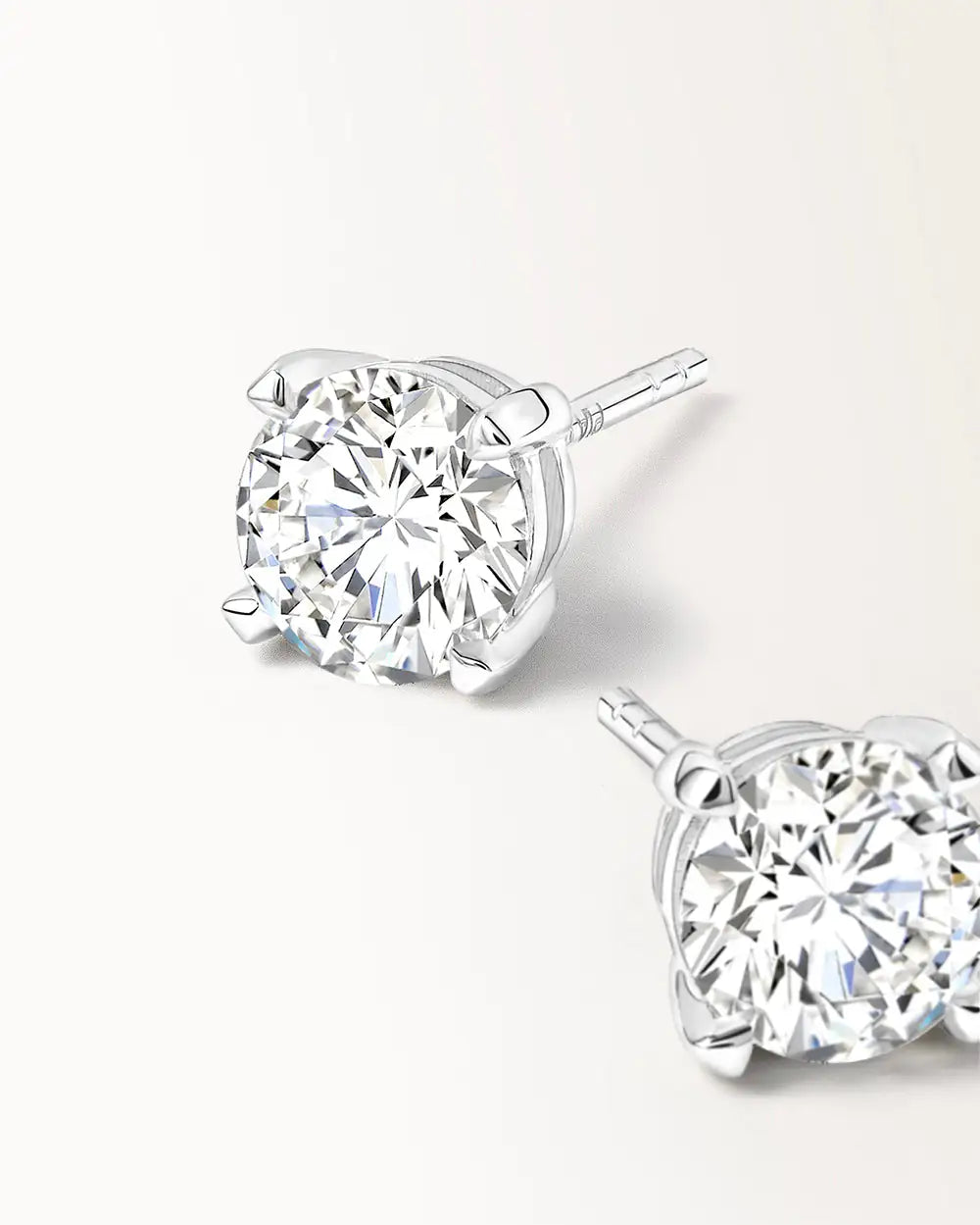 Boucles d'oreilles Infini 1 carat en or blanc